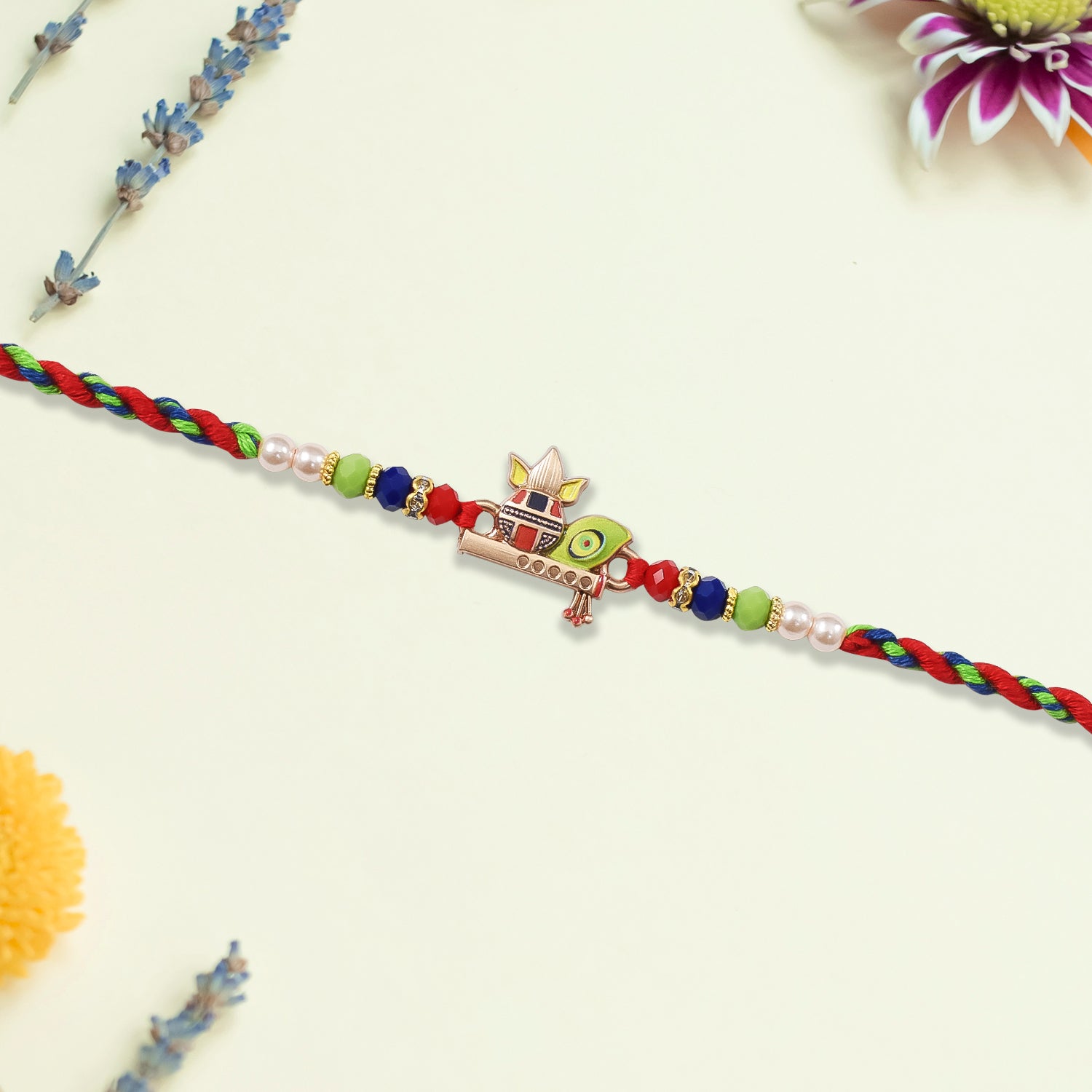 Kalash Rakhi With Flute And Peacock Feather Kalash Rakhi With Flute And Peacock Feather